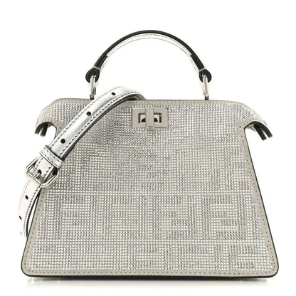 Crystal-embellished petite satchel bag with top handles and front square clasp, silver tone.