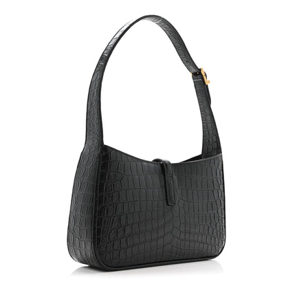 Black crocodile-embossed hobo bag with structured front and top handle.