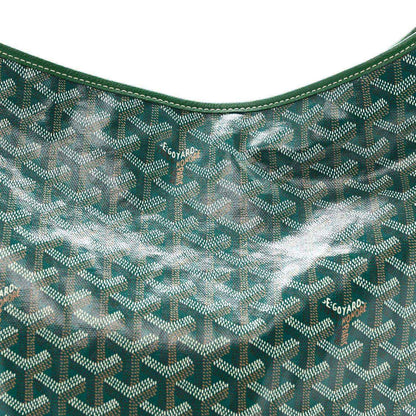Green chevron-pattern coated canvas interior with small logo print