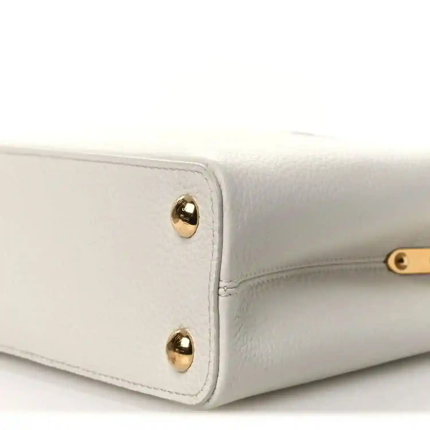 Louis Vuitton Capucines BB leather handbag corner with gold-tone studs and piping