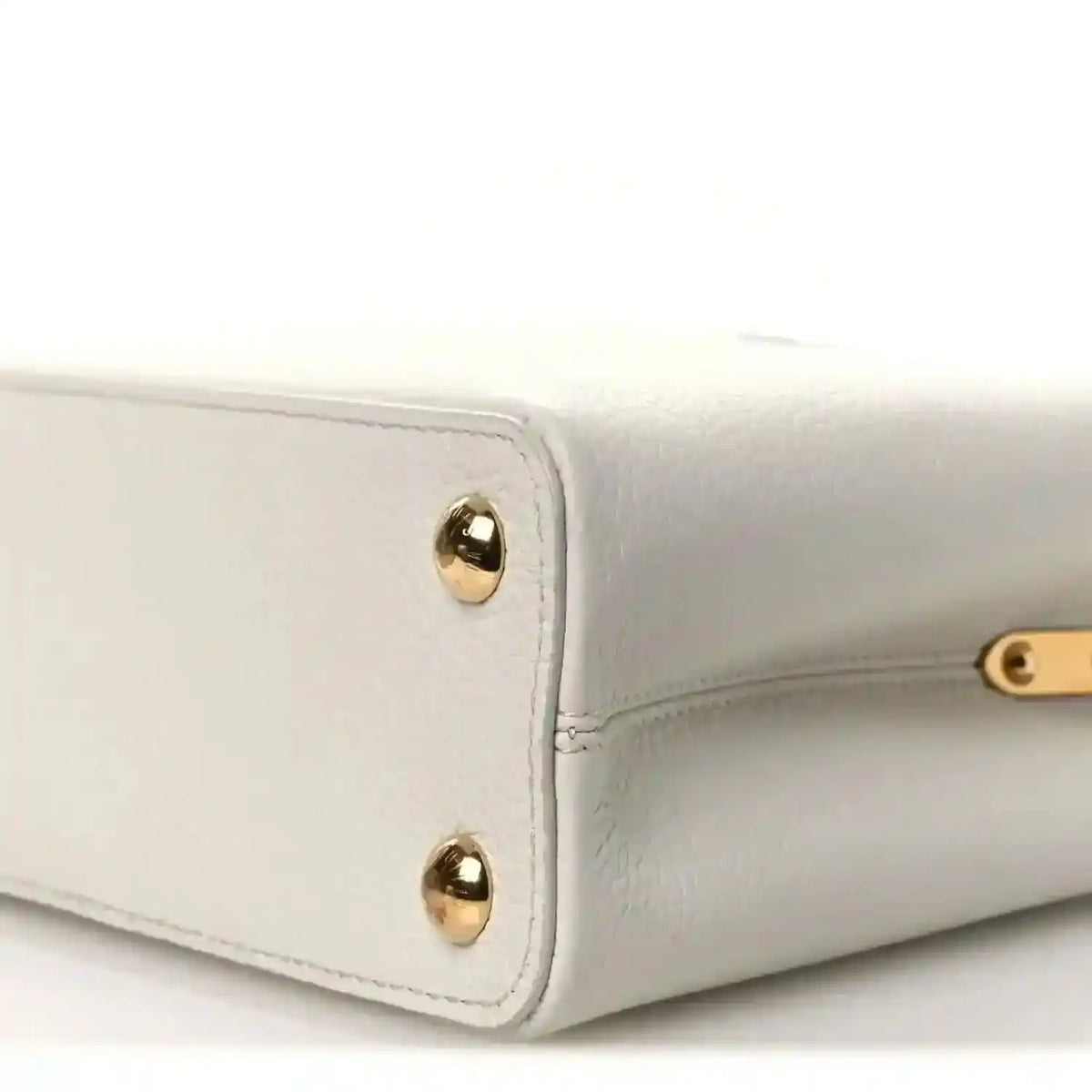 Louis Vuitton Capucines BB leather handbag corner with gold-tone studs and piping