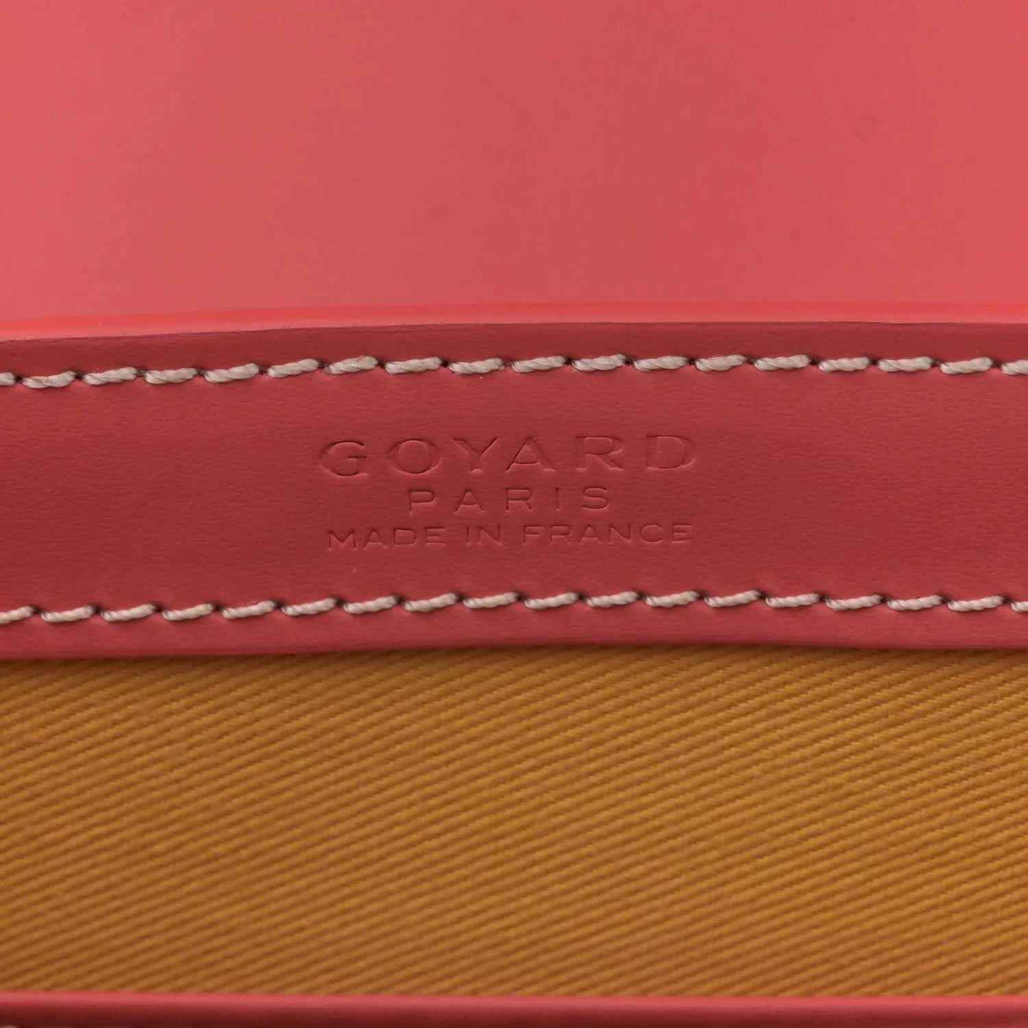 Pink canvas stamp text: GOYARD PARIS, MADE IN FRANCE, with contrast stitching.