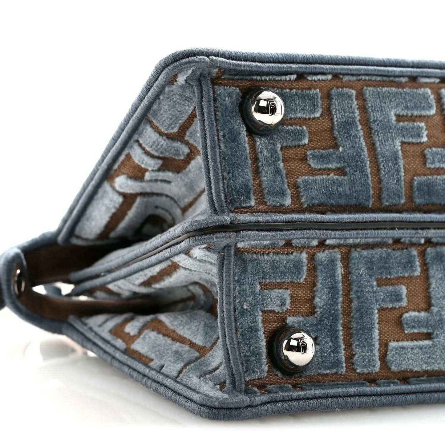 Satchel interior lining close-up with FF pattern and silver snap hardware