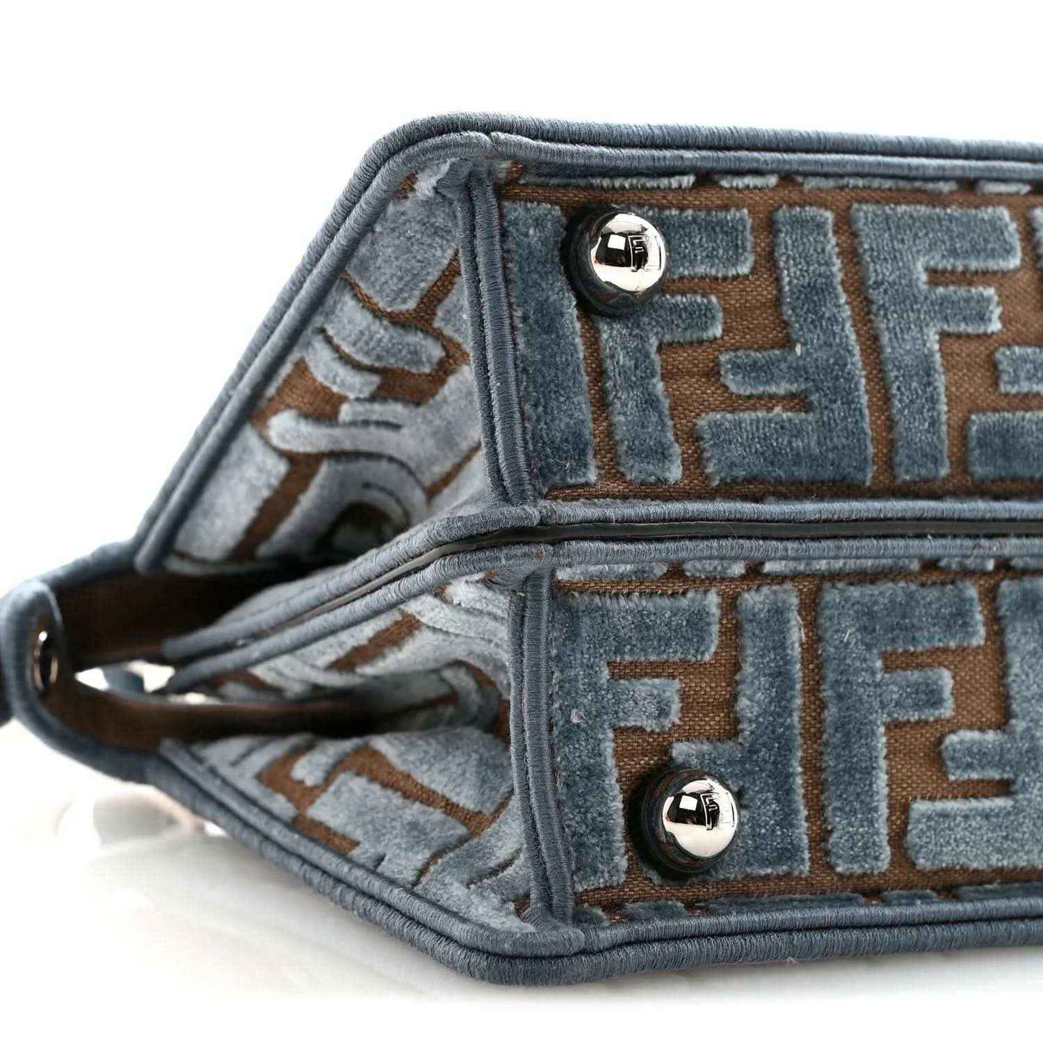 Satchel interior lining close-up with FF pattern and silver snap hardware