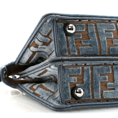 Satchel interior lining close-up with FF pattern and silver snap hardware
