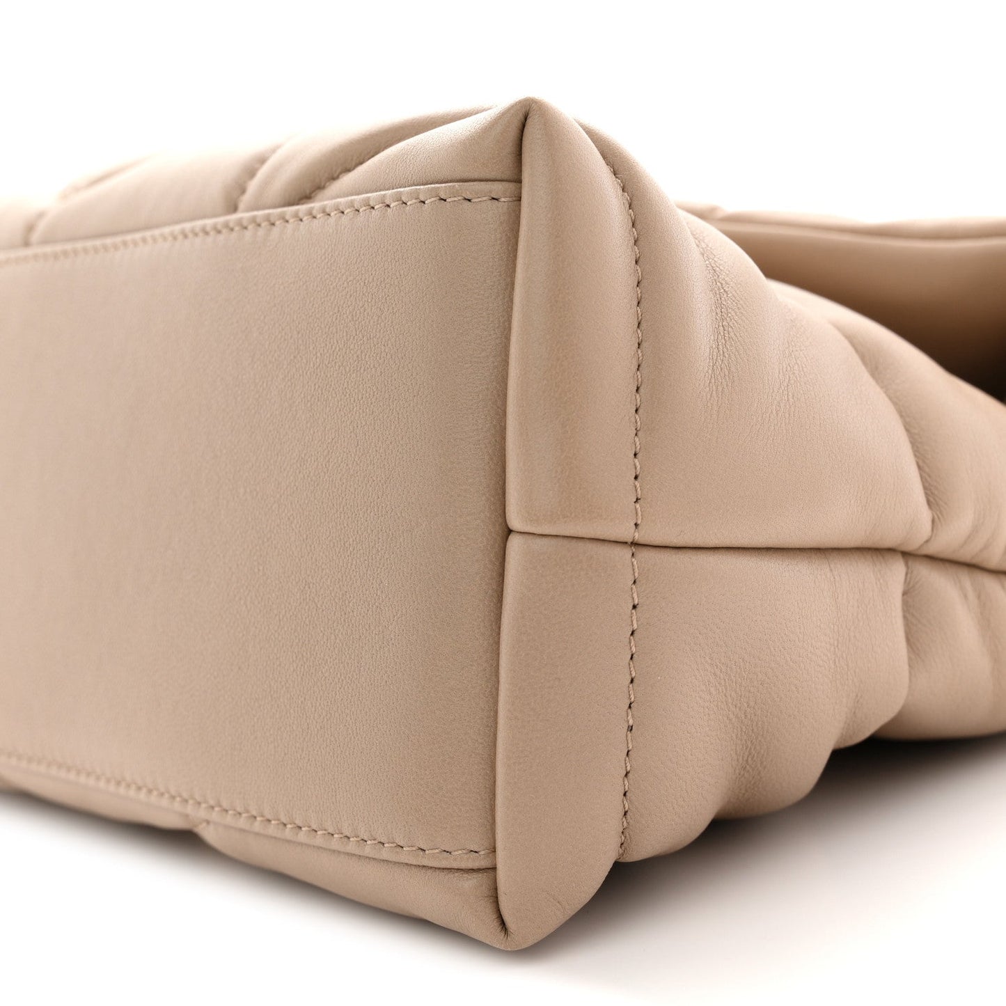 Saint Laurent quilted satchel end with stitched seams and padded structure, dark beige