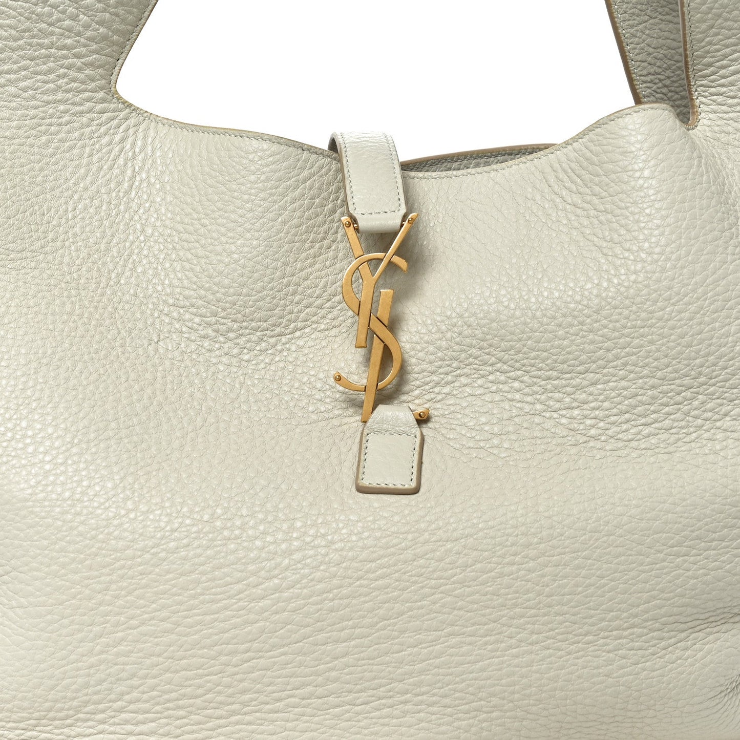 YSL charm key fob on white grained leather tote bag front