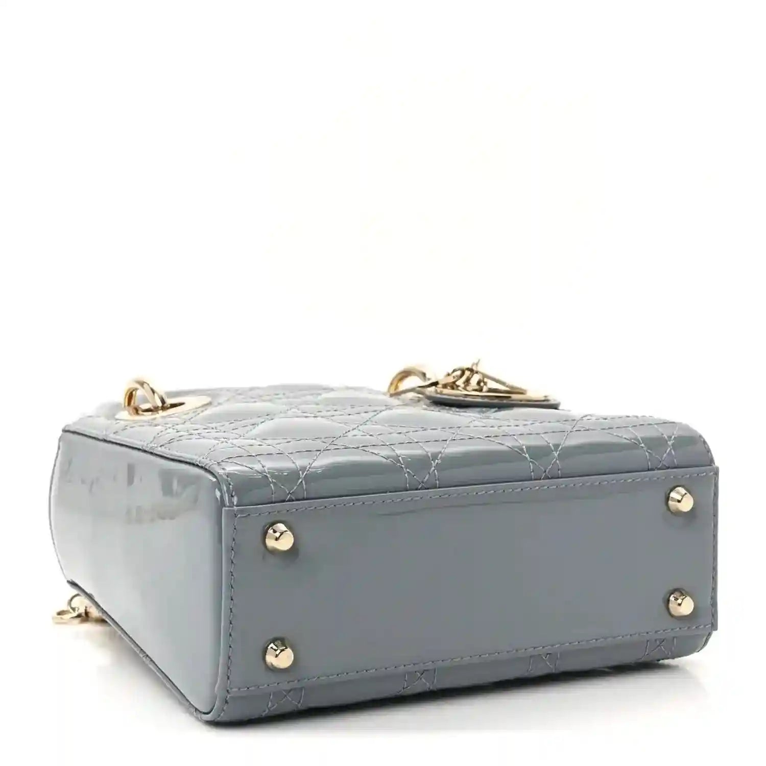 Light blue patent mini Lady Dior bag with gold-tone feet and top hardware