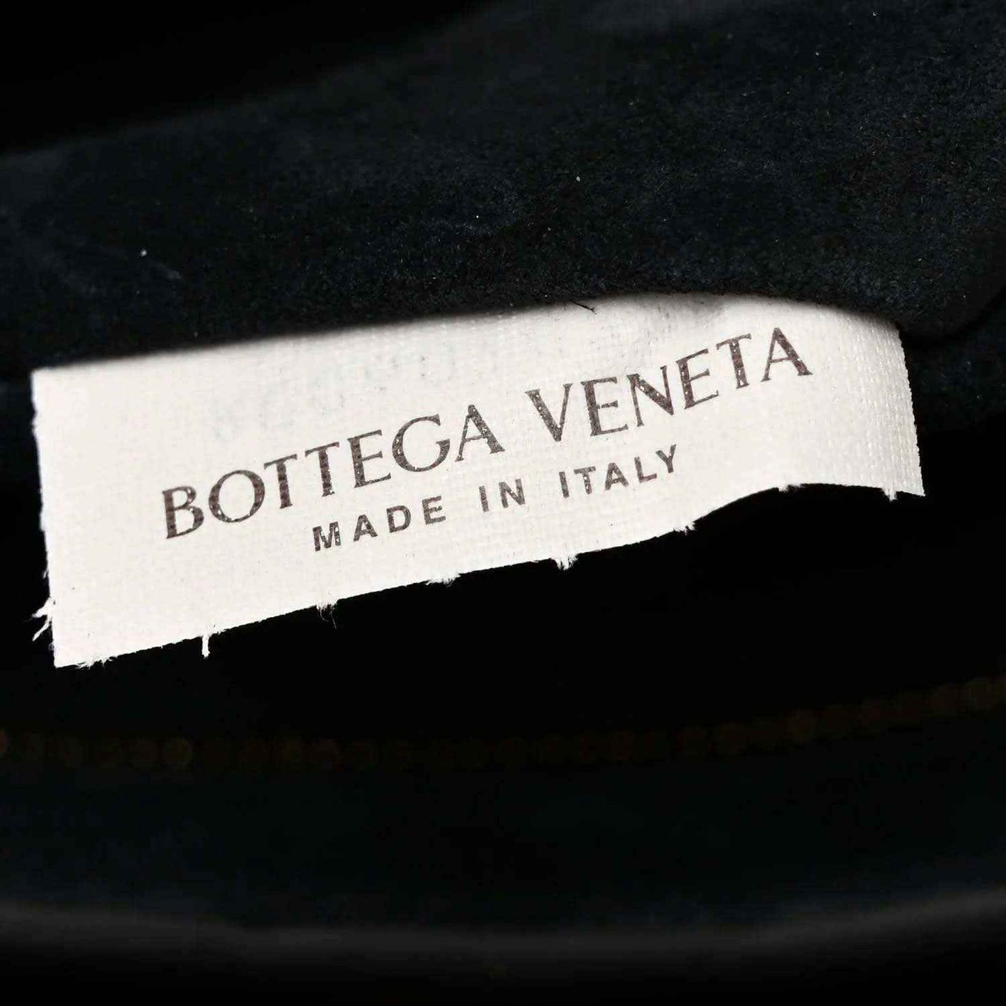 Brand authenticity label with Bottega Veneta and Made in Italy text.