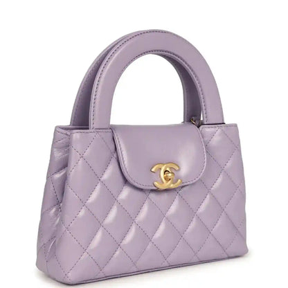 Chanel small Kelly shopper bag in light purple quilted leather with top handles