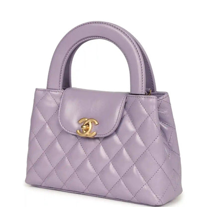 Chanel small Kelly shopper bag in light purple quilted leather with CC turn-lock