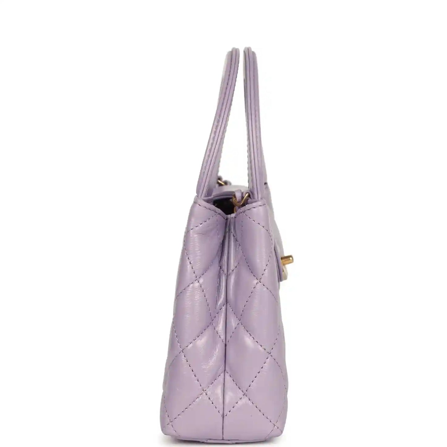 Chanel small Kelly shopper bag in light purple quilted leather with side opening