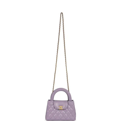 Chanel small Kelly bag in light purple quilted leather with gold-tone chain strap