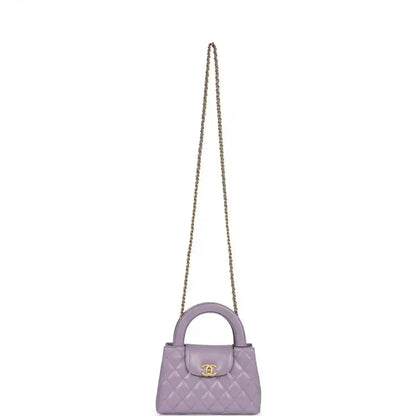 Chanel small Kelly bag in light purple quilted leather with gold-tone chain strap