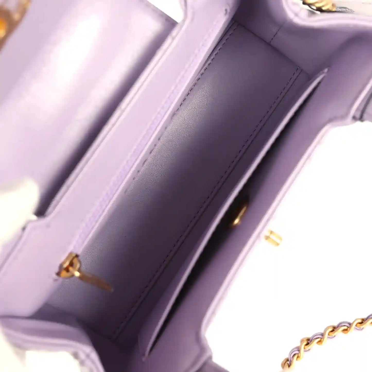 Chanel small Kelly shopper bag interior in light purple leather with compartments