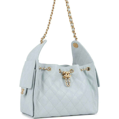 Light blue quilted caviar small hobo bag with gold chain strap and side slip pocket