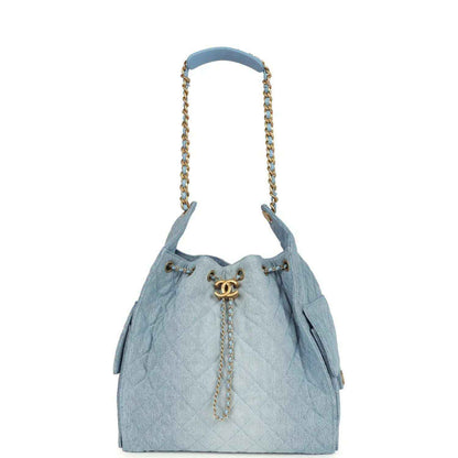Chanel medium 25 hobo bag, blue washed denim, gold chain handles and CC charm