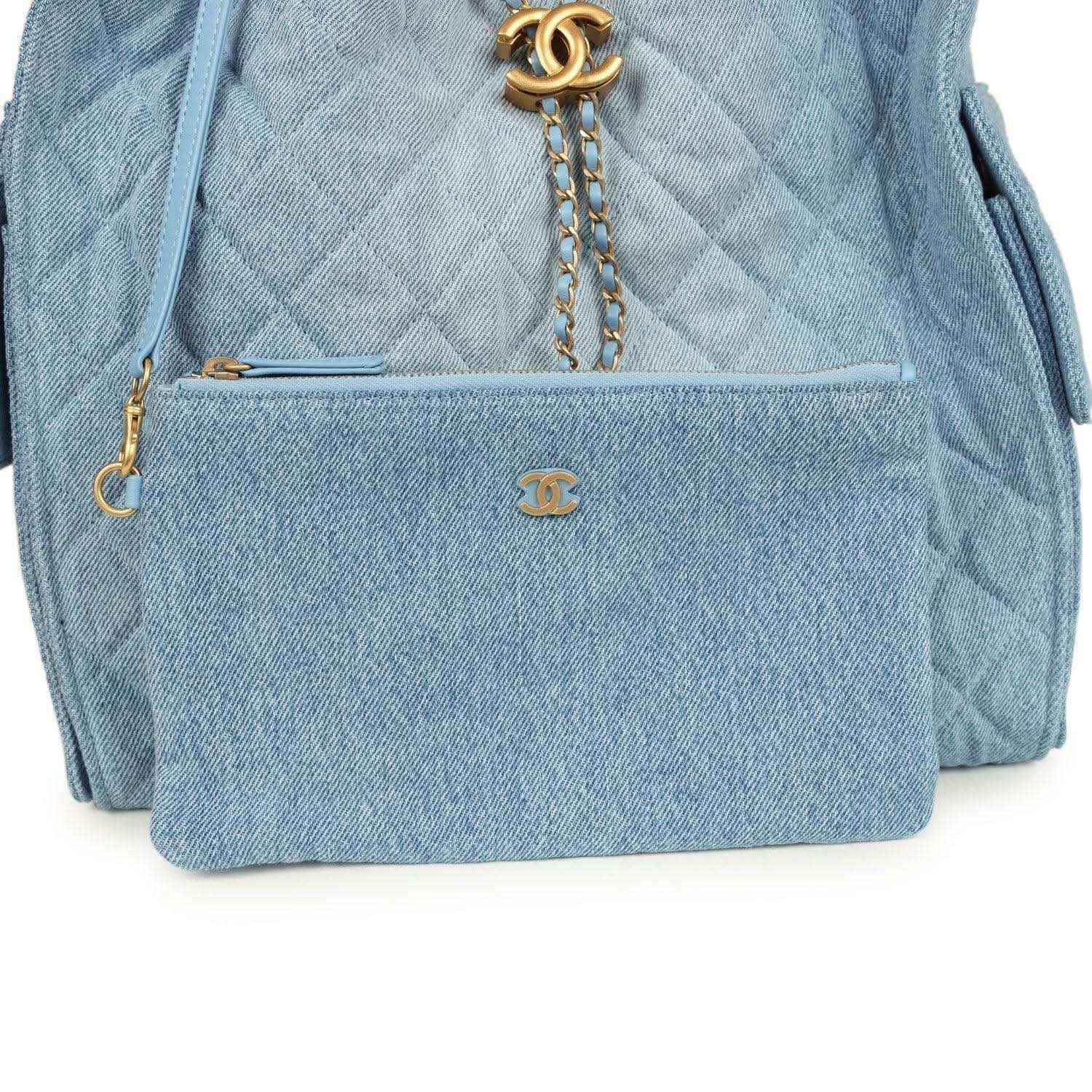 Chanel medium 25 hobo bag, blue denim exterior pocket with gold CC clasp