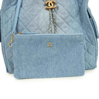 Chanel medium 25 hobo bag, blue denim exterior pocket with gold CC clasp