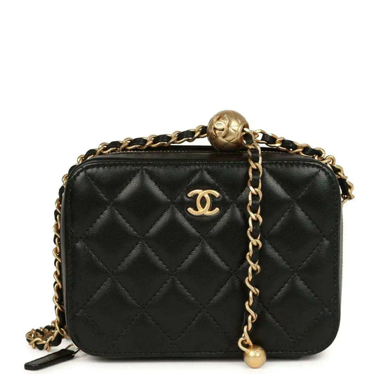 Black quilted lambskin Chanel clutch with gold chain strap and CC logo