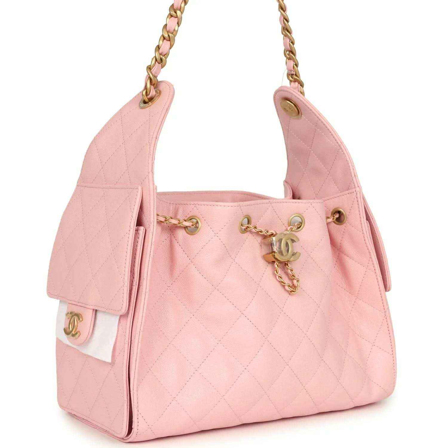 Small hobo bag light pink quilted caviar with gold-tone chain handles and side panel