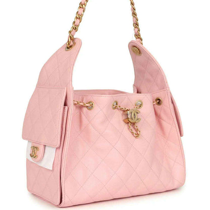 Small hobo bag light pink quilted caviar with gold-tone chain handles and side panel