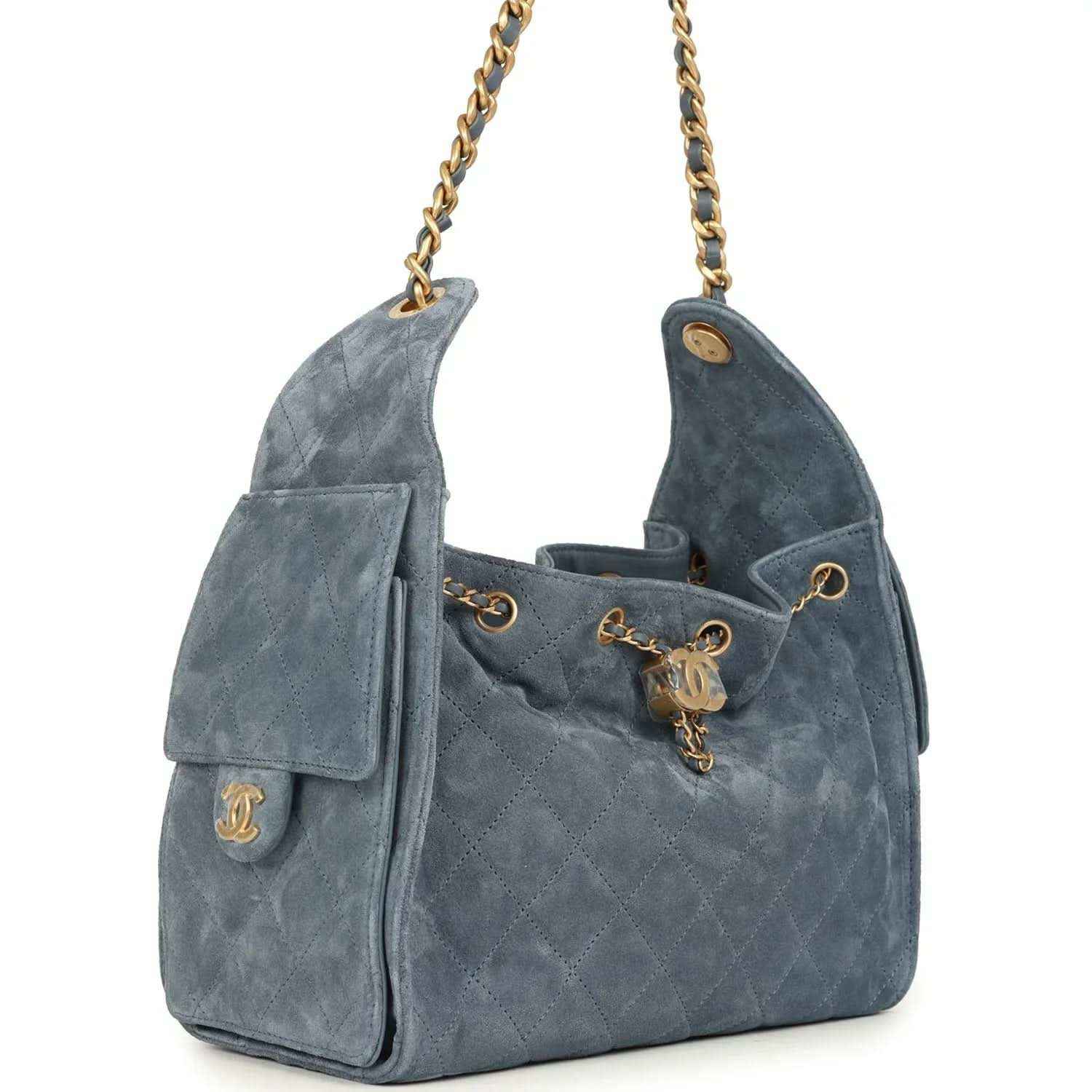 Small Chanel hobo bag in blue suede with quilted texture, side flap pocket, gold chain