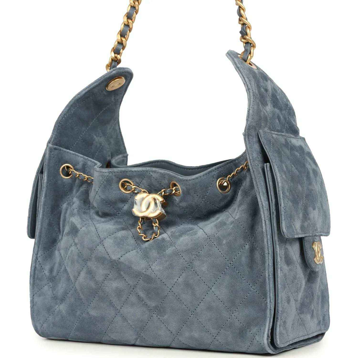 Small Chanel hobo bag in blue suede with quilted front, front flap, and gold chain strap