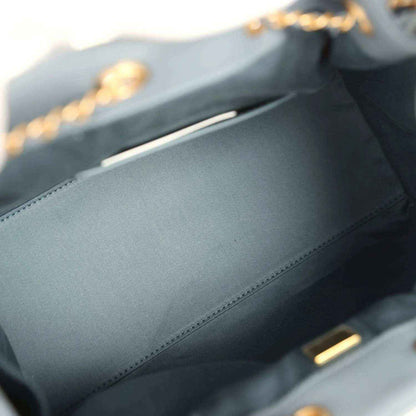 Chanel hobo bag interior lining with stitched seam and top zipper pull