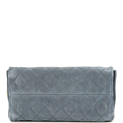 Small Chanel hobo bag in blue suede with diamond-quilt flap and slim gold top trim
