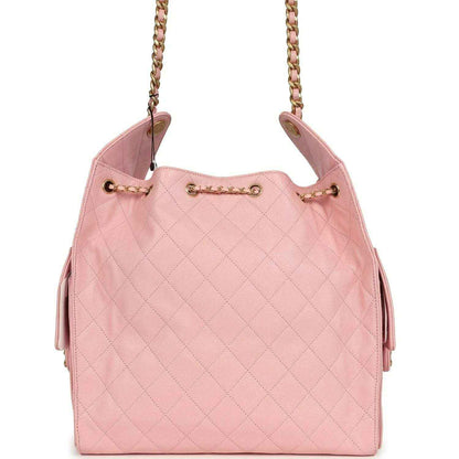 Light pink quilted caviar leather hobo bag with gold chain straps and front hardware