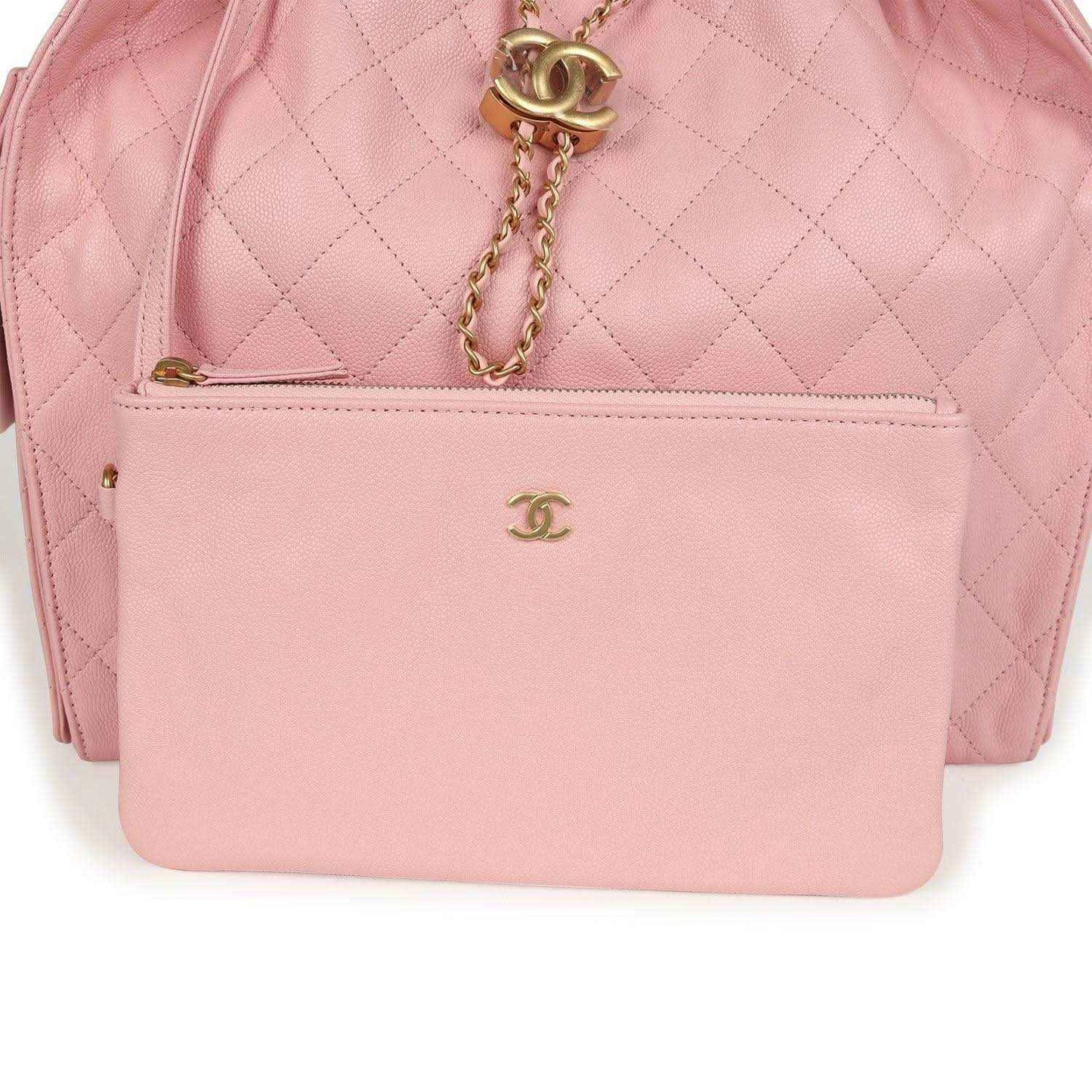 Light pink quilted caviar leather hobo bag with CC logo on front inner pocket