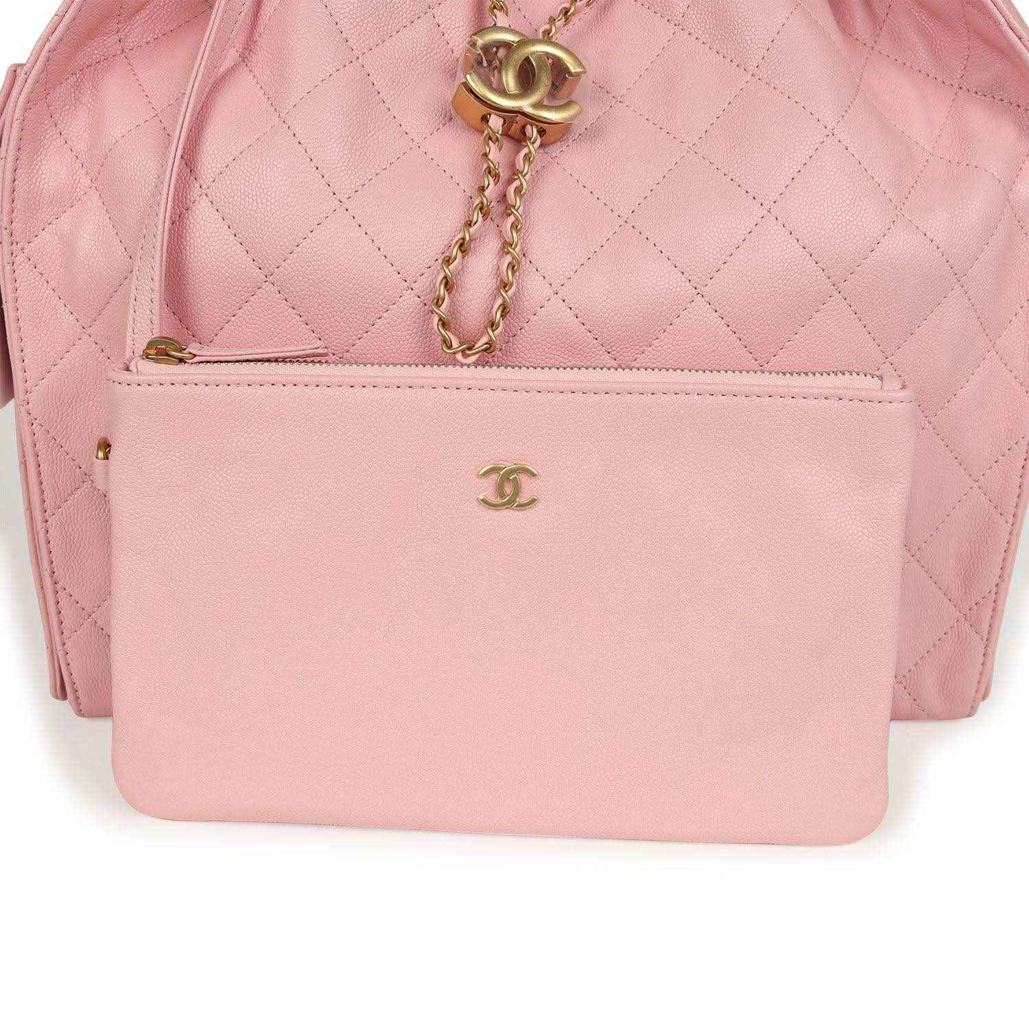 Light pink quilted caviar leather hobo bag with CC logo on front inner pocket