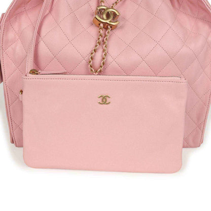 Light pink quilted caviar leather hobo bag with CC logo on front inner pocket