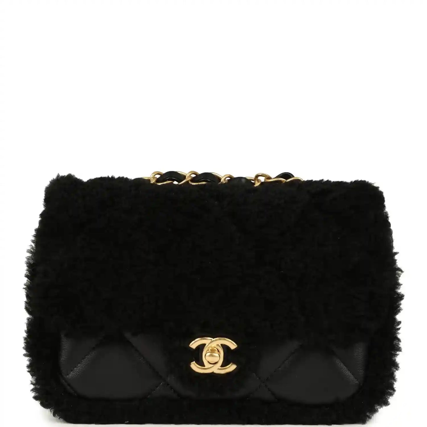 Black mini flap bag with shearling and quilted flap, gold CC logo and chain handle