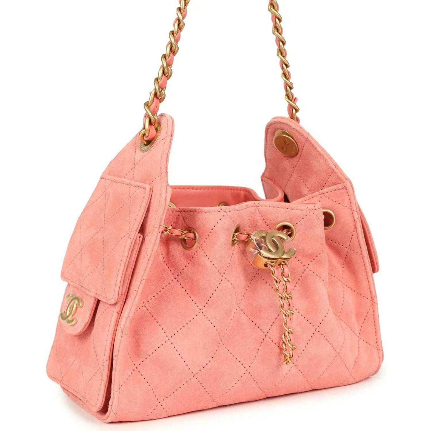 Chanel mini hobo bag in pink suede with quilted pattern, chain strap, and gold hardware
