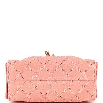 Chanel mini hobo bag in pink suede with diamond-quilted design and top flap