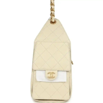 Light beige quilted mini hobo bag with gold-tone chain and CC logo on flap