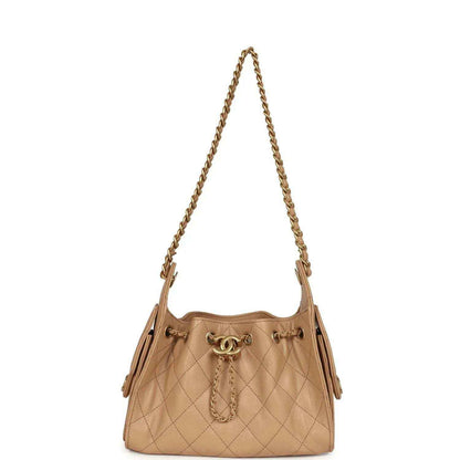 Beige mini hobo bag with chain shoulder strap and diamond-quilted caviar leather body