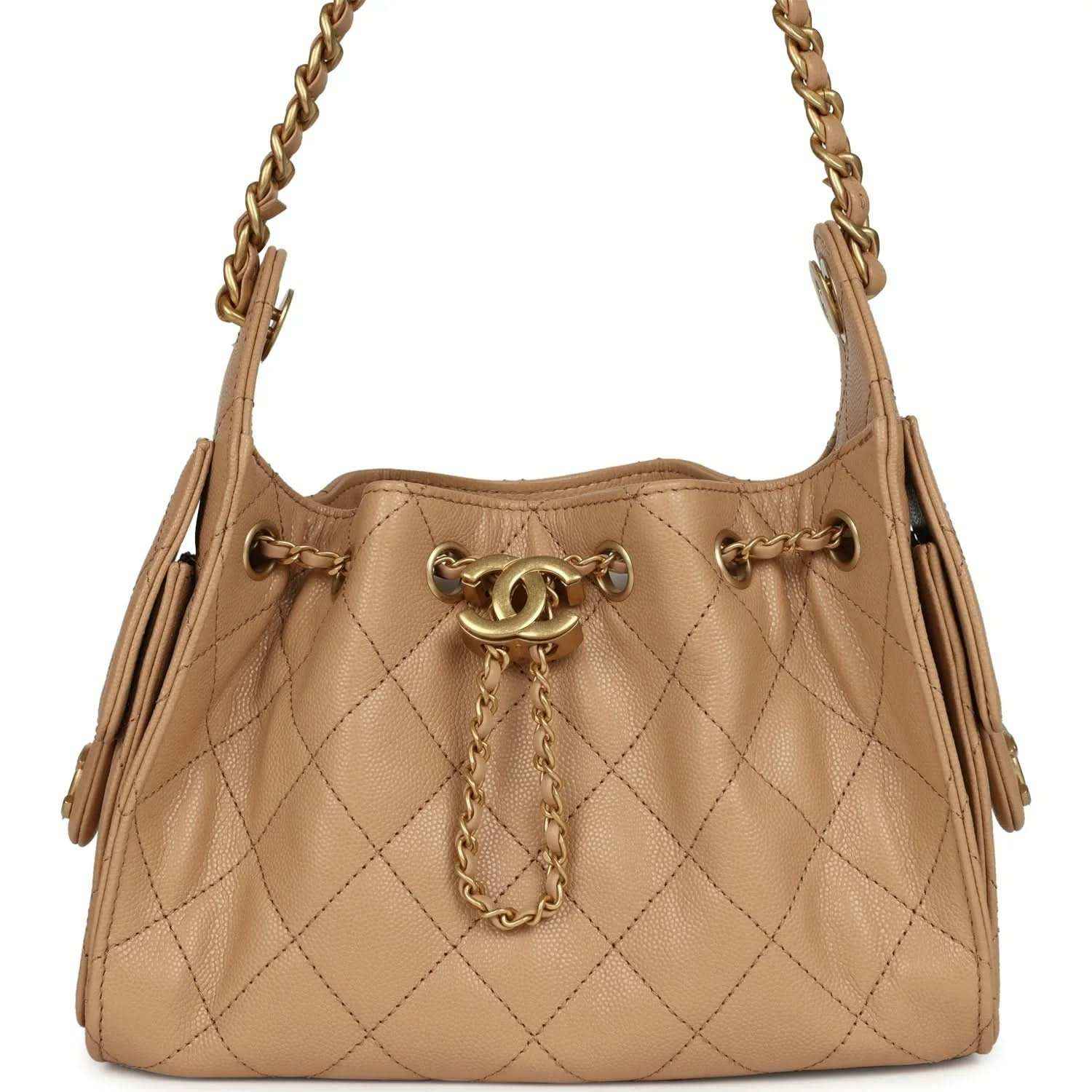 Beige mini hobo bag with diamond-quilted caviar leather and chain shoulder strap