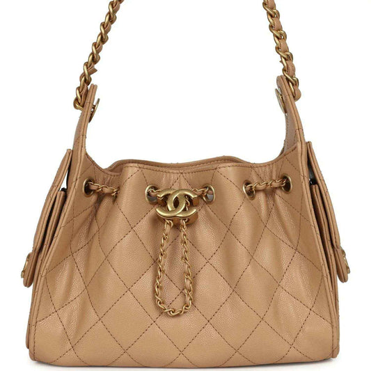 Beige mini hobo bag with diamond-quilted caviar leather and chain shoulder strap