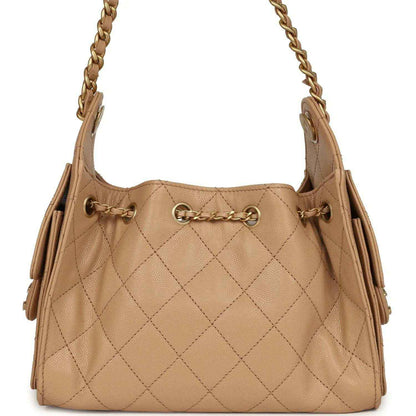 Beige mini hobo bag in quilted caviar leather with chain straps and gold-toned hardware