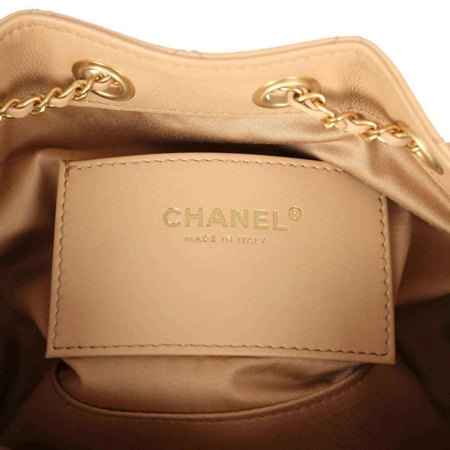 Chanel mini hobo bag interior label with stitched logo patch and chain detail