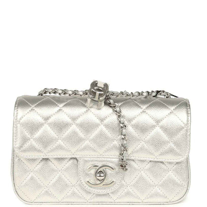 Chanel mini CC flap bag in silver metallic with quilted flap and CC logo