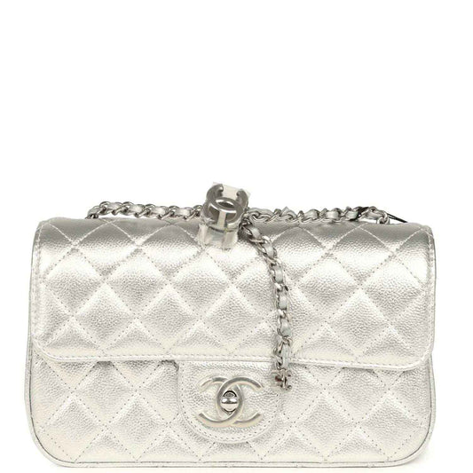 Chanel mini CC flap bag in silver metallic with quilted flap and CC logo