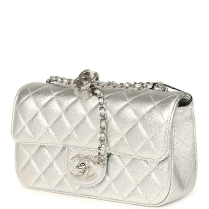 Chanel mini CC flap bag in silver metallic with quilted flap and chain strap