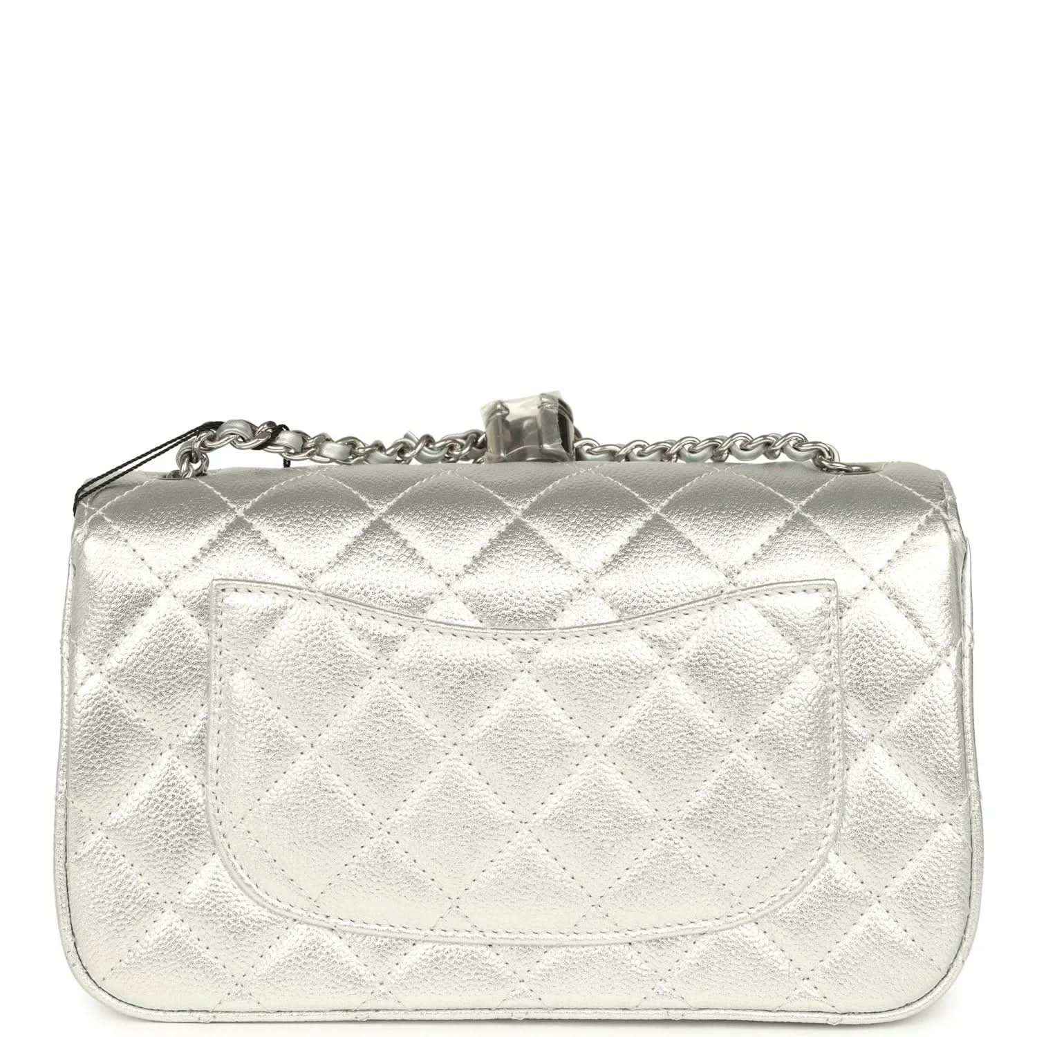 Chanel mini CC flap bag rear view in silver metallic with quilted diamond pattern