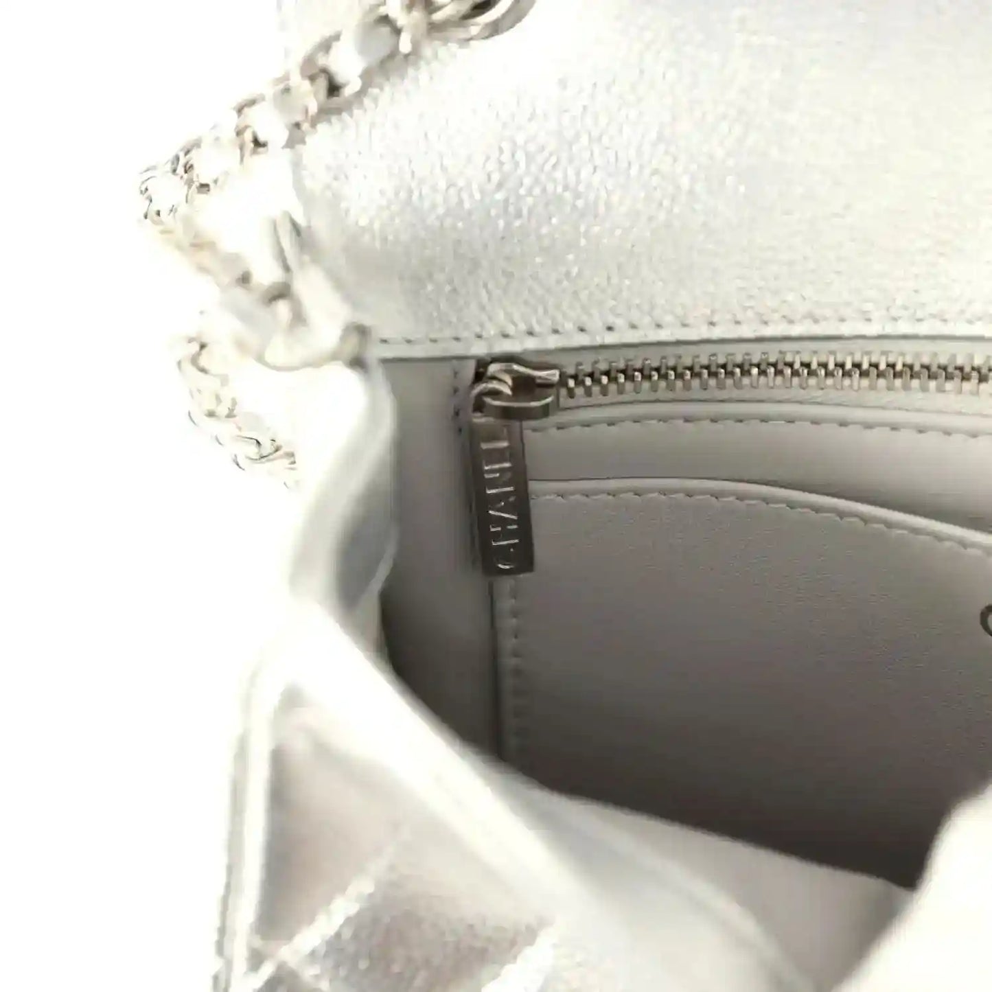 Chanel mini CC flap bag, silver metallic caviar, visible zipper and lining