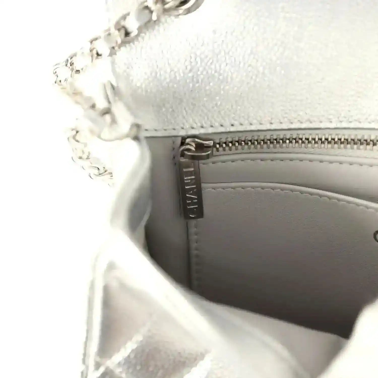 Chanel mini CC flap bag, silver metallic caviar, visible zipper and lining