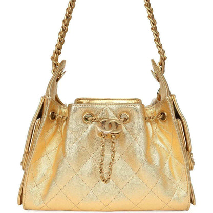 Chanel mini hobo bag in metallic gold quilted caviar leather with chain handles